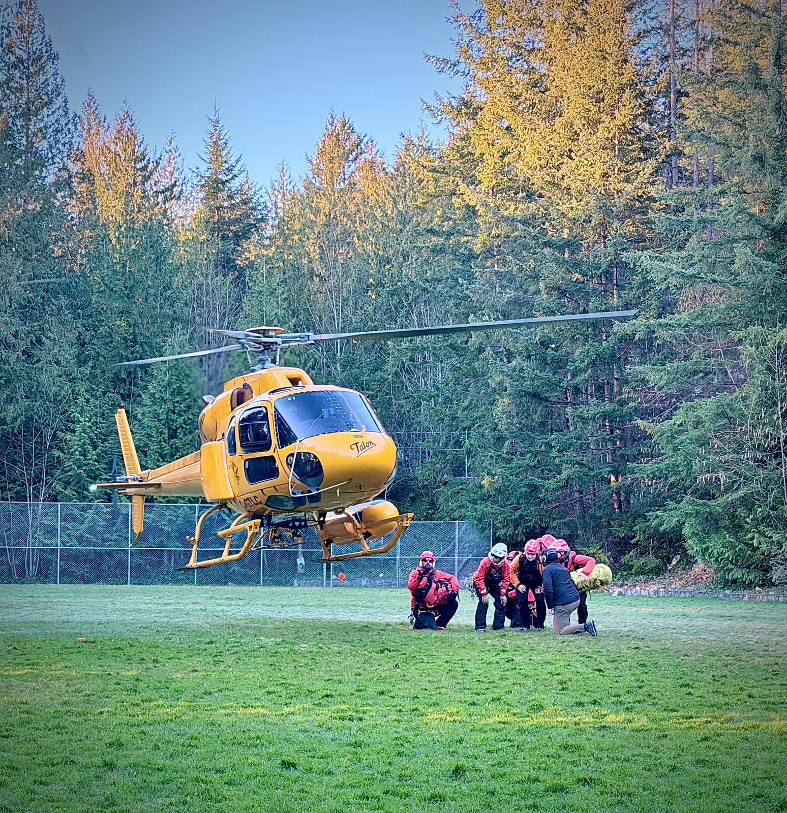 Loading patient into Talon Helicopters aircraft